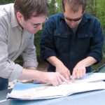 IMG_5486 John Burrows and Jacob Amon studing sampling sites on the Mousam River